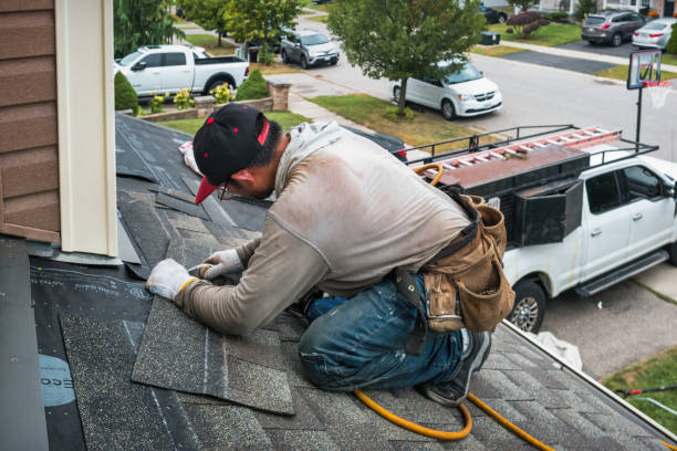 Professional Gutter Repair And Installation technician working in Owosso, MI